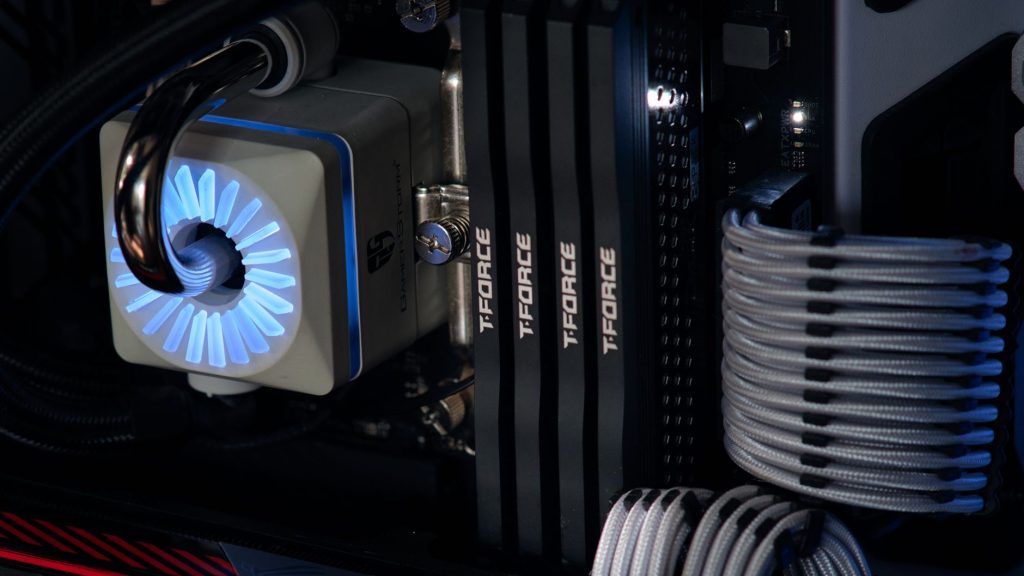Gaming PC interior with a custom water loop cooling both the CPU and a full cover GPU water block