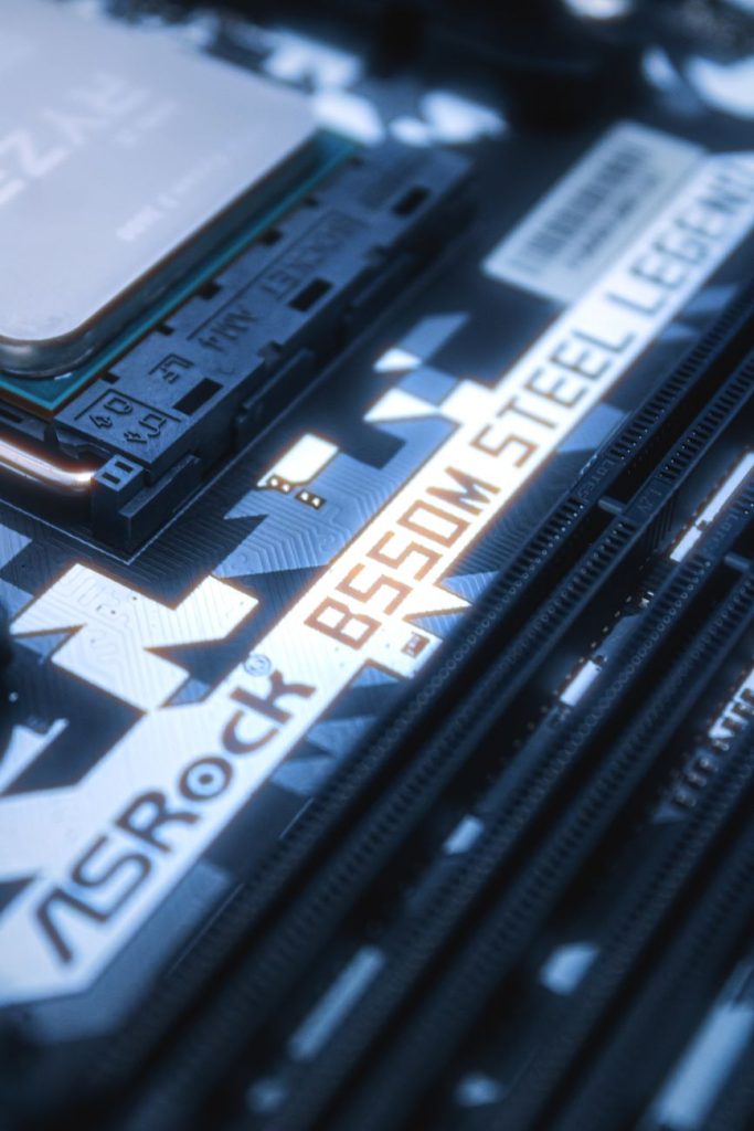 ASRock B550M Steel Legend motherboard with an AMD Ryzen CPU in its socket next to the RAM slots
